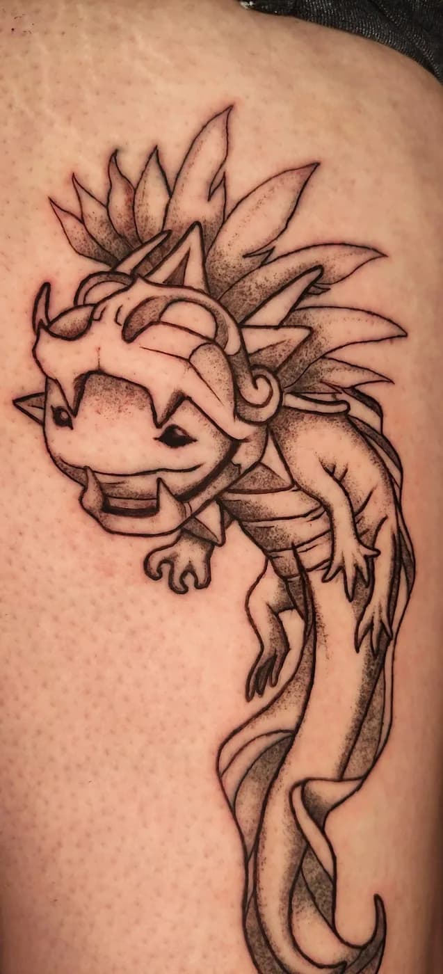 Ajolote con sombreado en puntillismo tatuado sobre la pierna.
